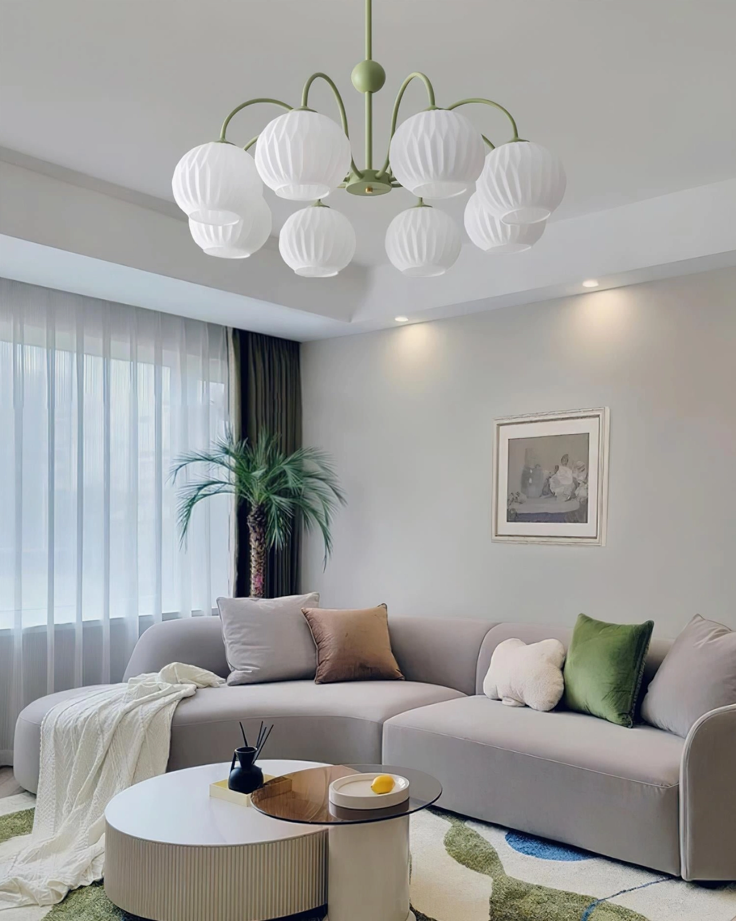 Renee white frame globe chandelier in Scandinavian minimal interior design setting