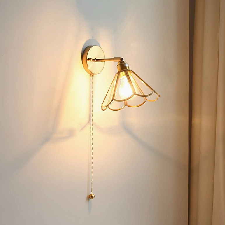 Standard Rennes brass wall sconce flared petal glass warm ambient light