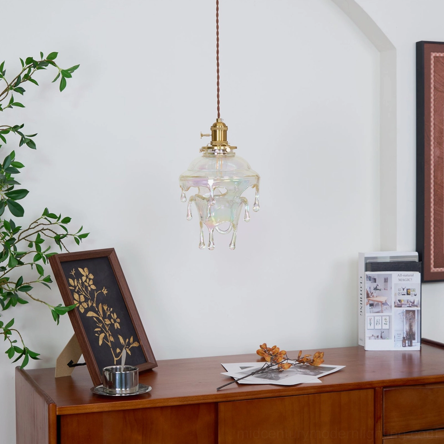 Studio lighting detail of resin pendant showing crystal clear and colored glazed finish comparison