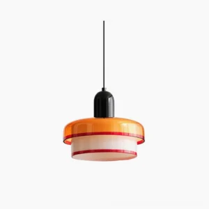 Retro color-block pendant light with orange white and red layered glass shade and black metal fixture on white background