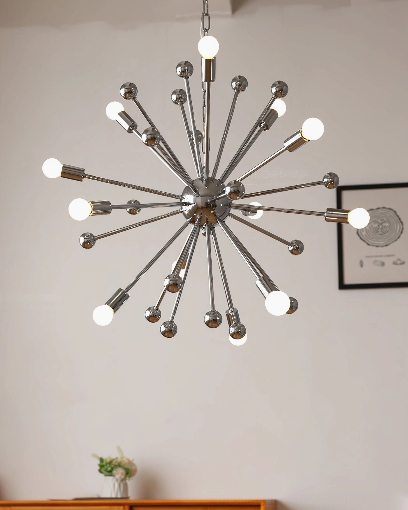 Retro space-age sputnik chandelier illuminated warm bulbs mid-century interior