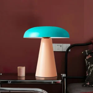Rhea mushroom lamp bedside styling with scented candle and wine red accent wall bedroom setting