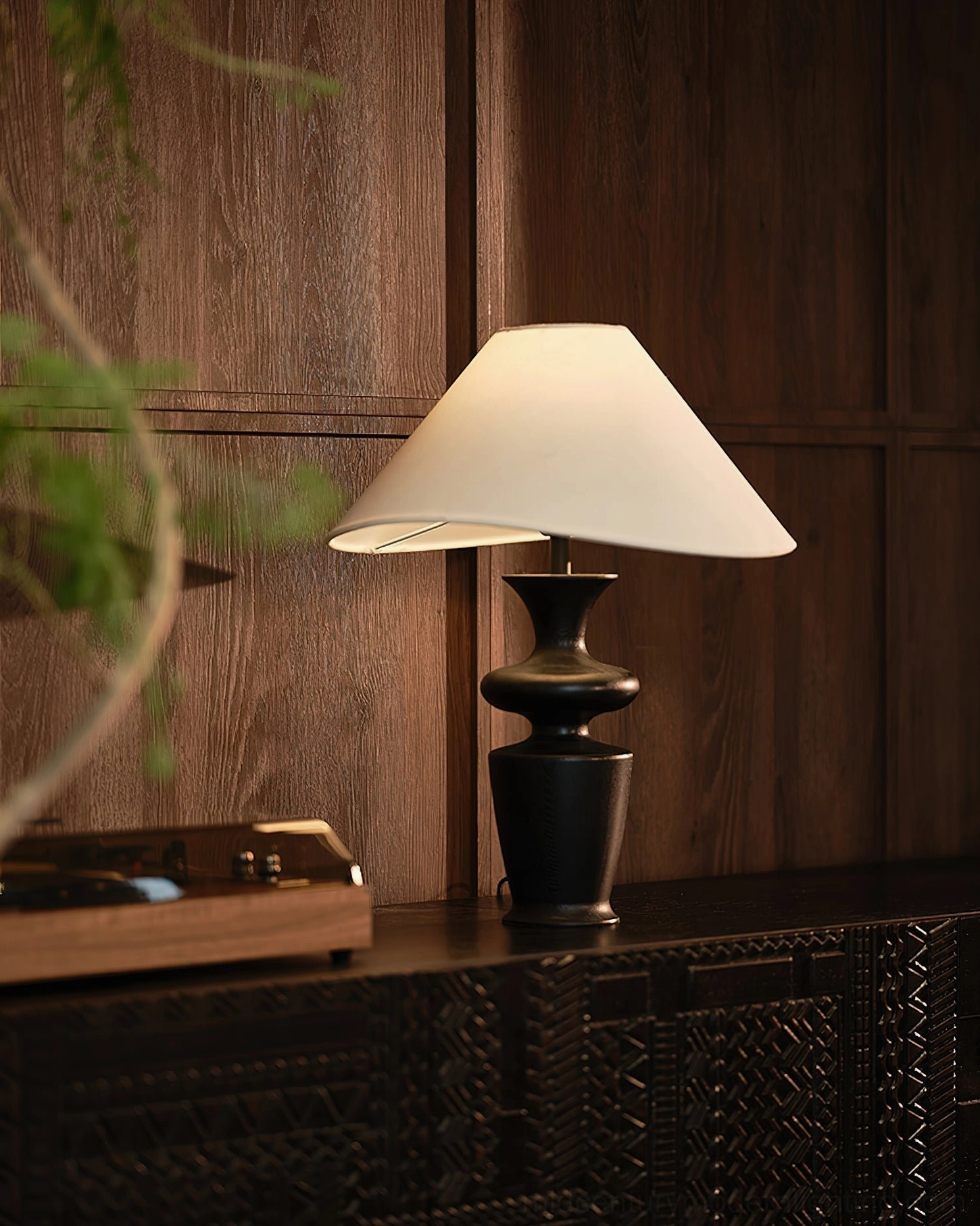 Rhodes table lamp with black and white finishes showing artistic asymmetrical shade design details