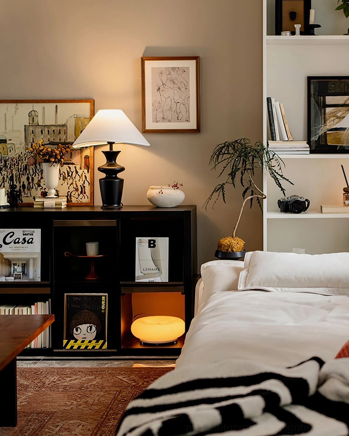 Rhodes mid-century modern table lamp full profile showing sculptural black wood base and white fabric shade design