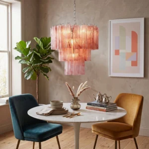 Pink gradient ribbed glass chandelier in modern dining room with warm bohemian styling