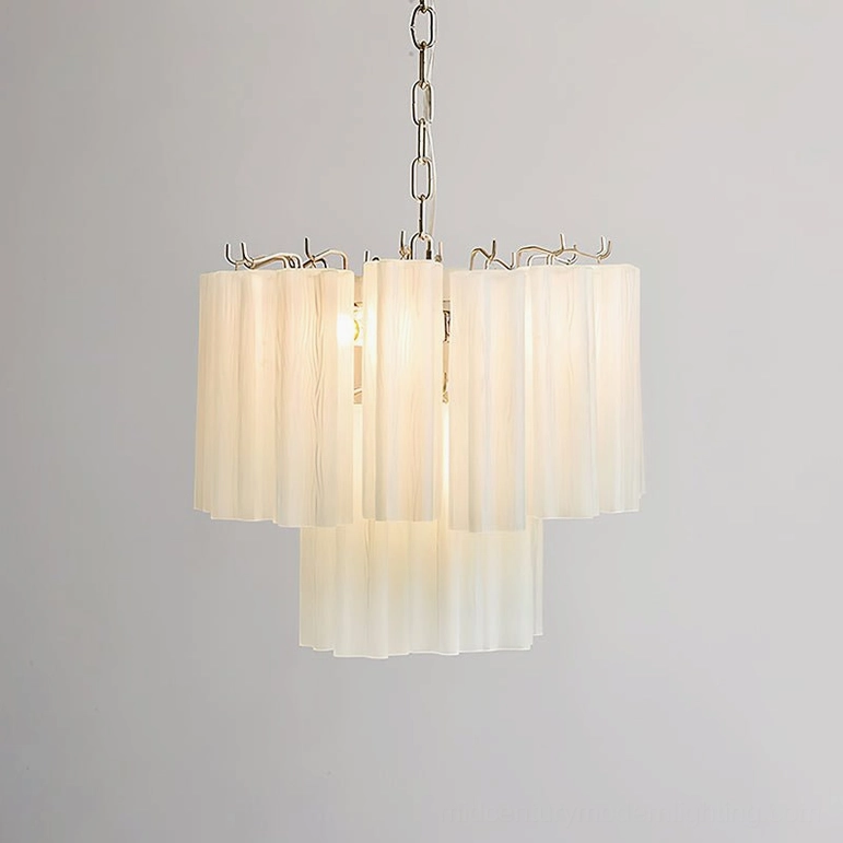 Three-layer light pink ribbed glass chandelier detail view highlighting geometric design