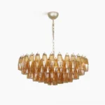 Rhombus Murano Chandelier - hand-blown amber glass with 141 geometric rhombi suspended from metal frame, studio front view