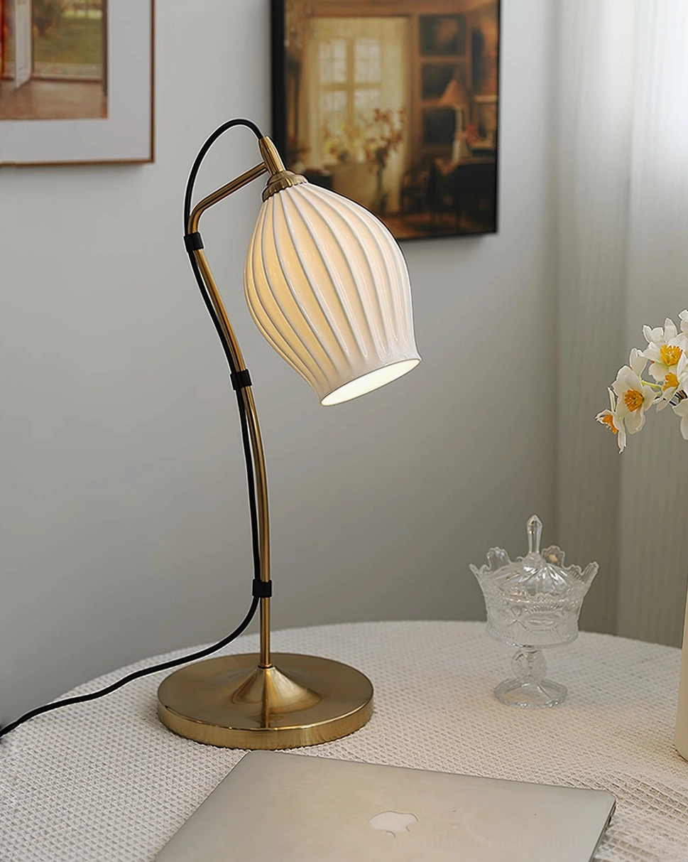 Ribbed ceramic table lamp lifestyle shot in contemporary home interior design setting