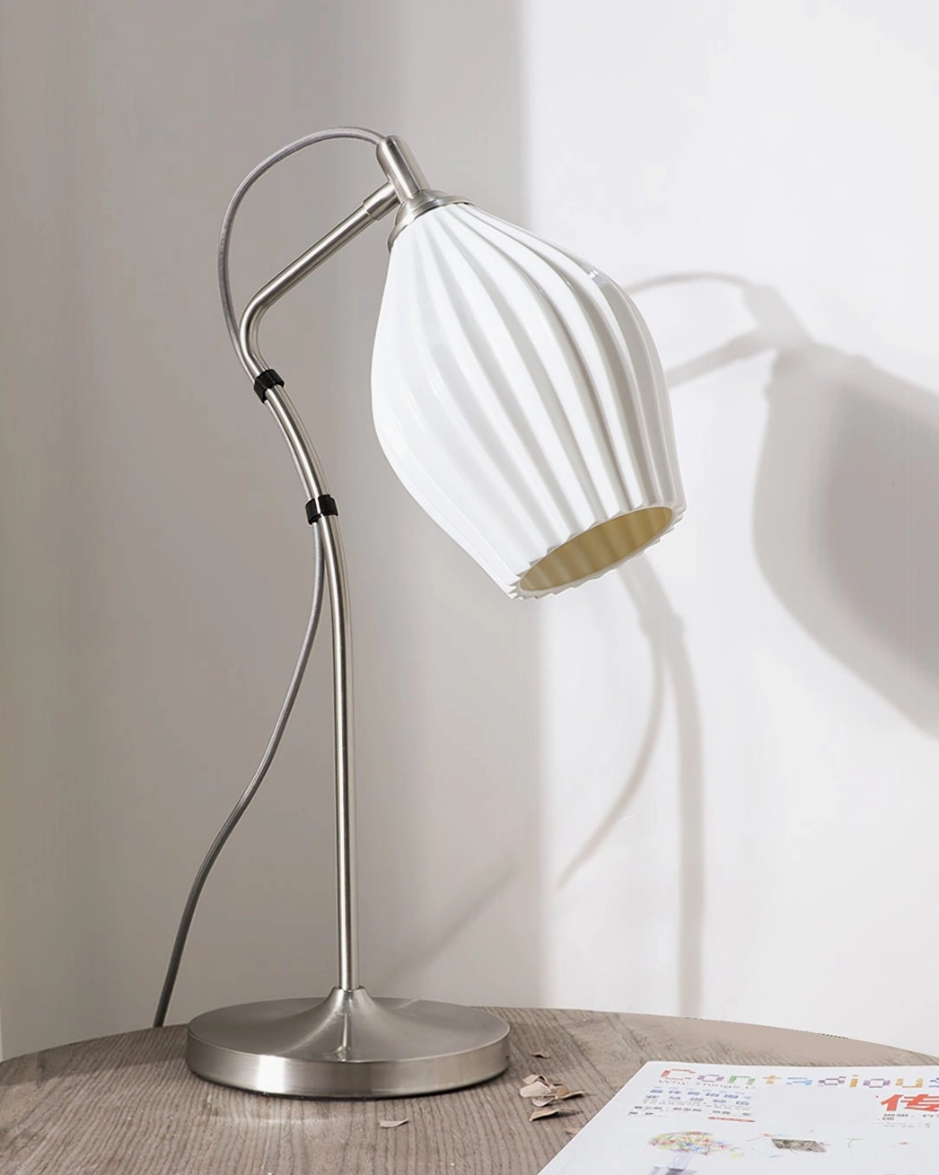 Ribbed ceramic table lamp floor model showing full height and proportions in room setting
