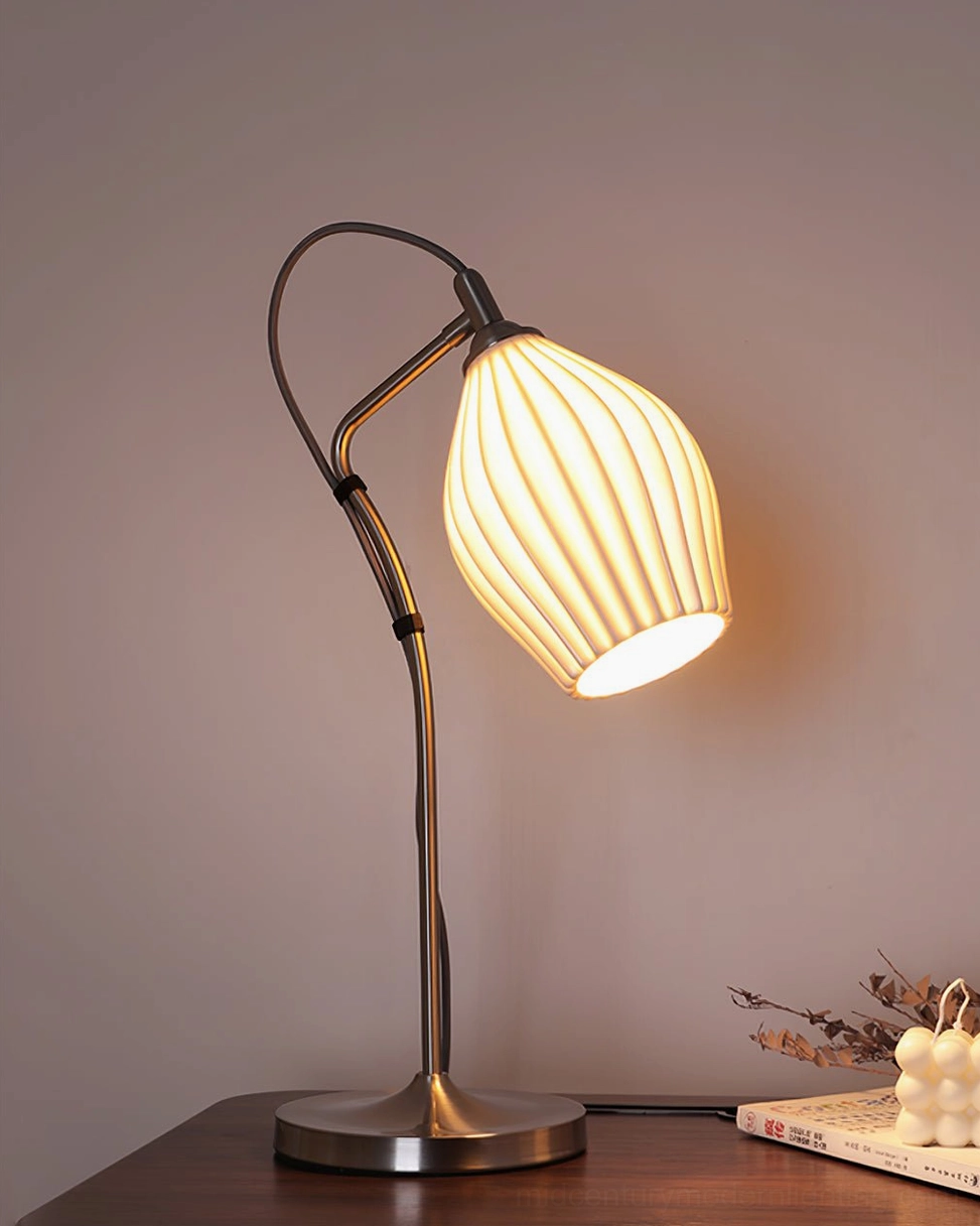Ribbed ceramic table lamp paired with other mid-century modern furniture and decor styling