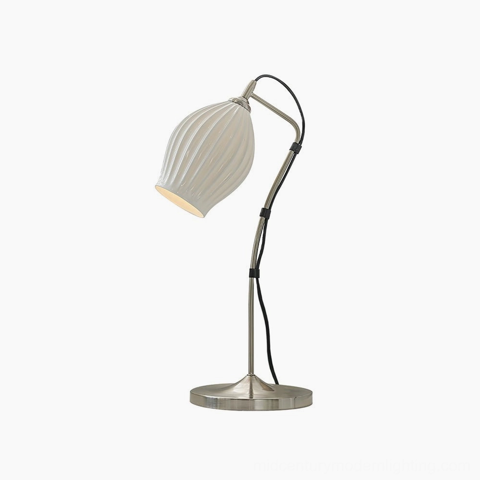 Ribbed ceramic table lamp sand nickel finish complete view with warm metallic base styling