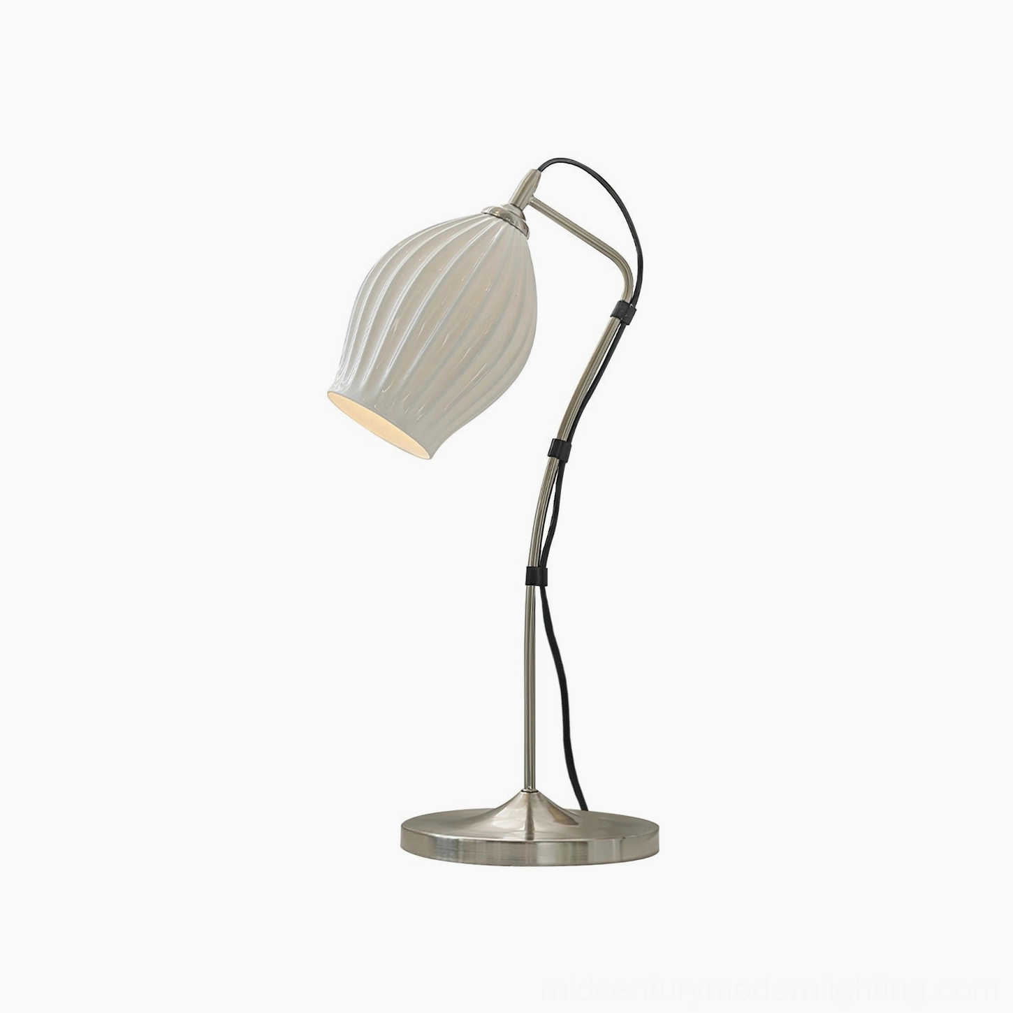 Ribbed ceramic table lamp front view highlighting sculptural shade and clean minimalist base design