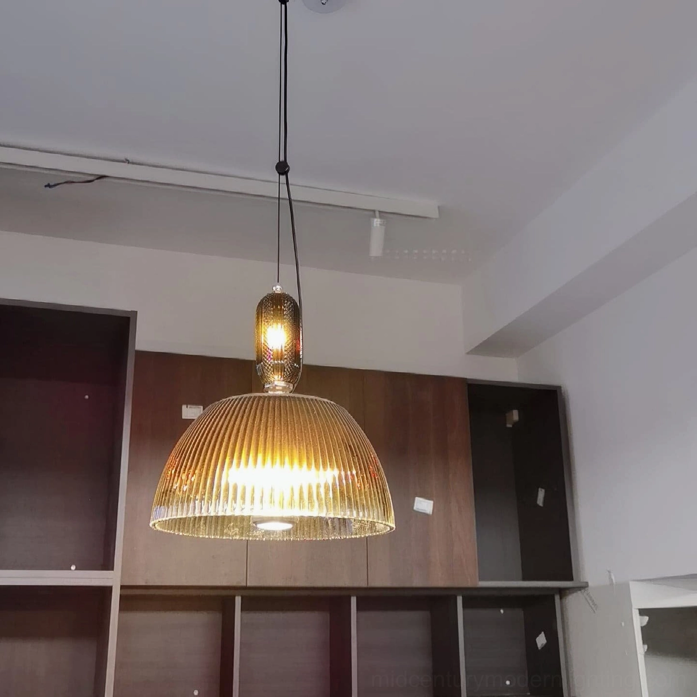 Ribbed glass pendant lamp in both size variants displayed showing 30cm and 34cm height options
