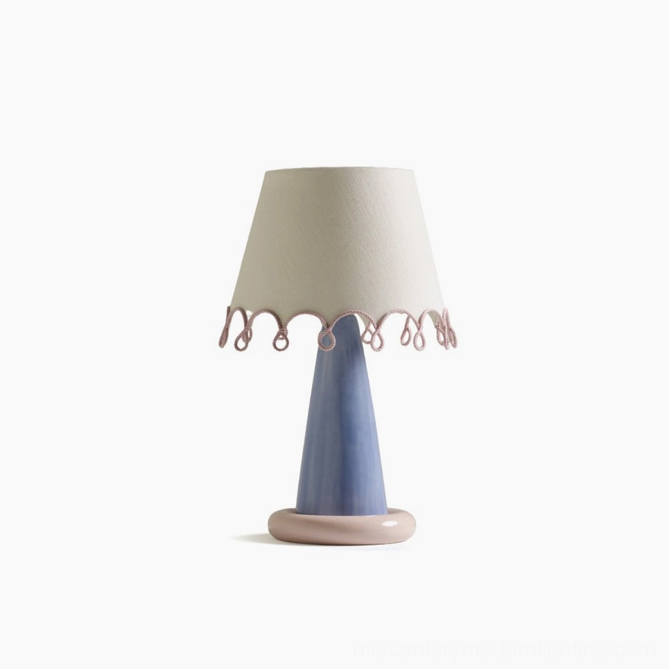 Ribbon table lamp product hero image featuring ceramic craftsmanship and contemporary pink and blue finish coordination