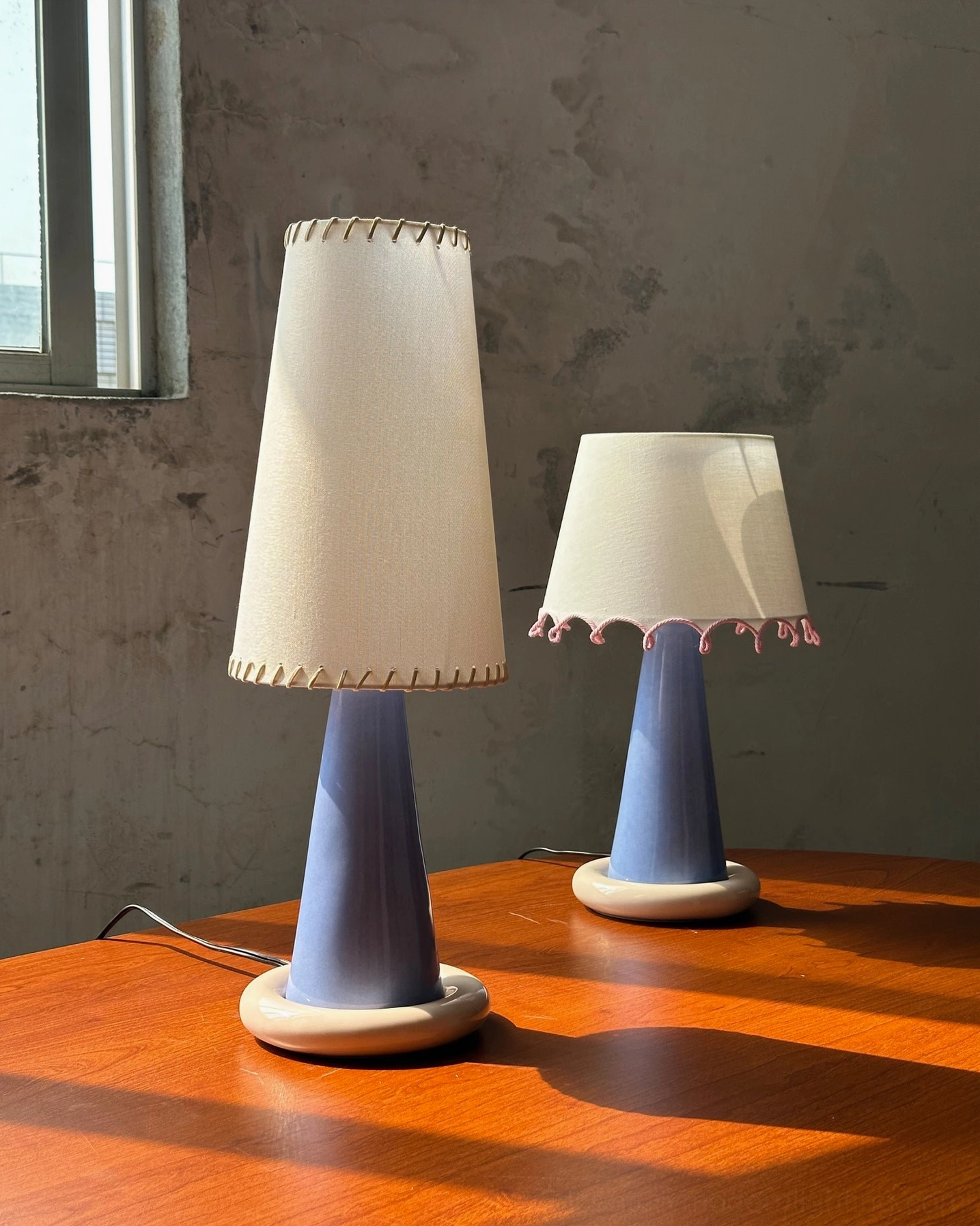 Ribbon table lamp styled in contemporary interior setting demonstrating functional and decorative lighting capabilities