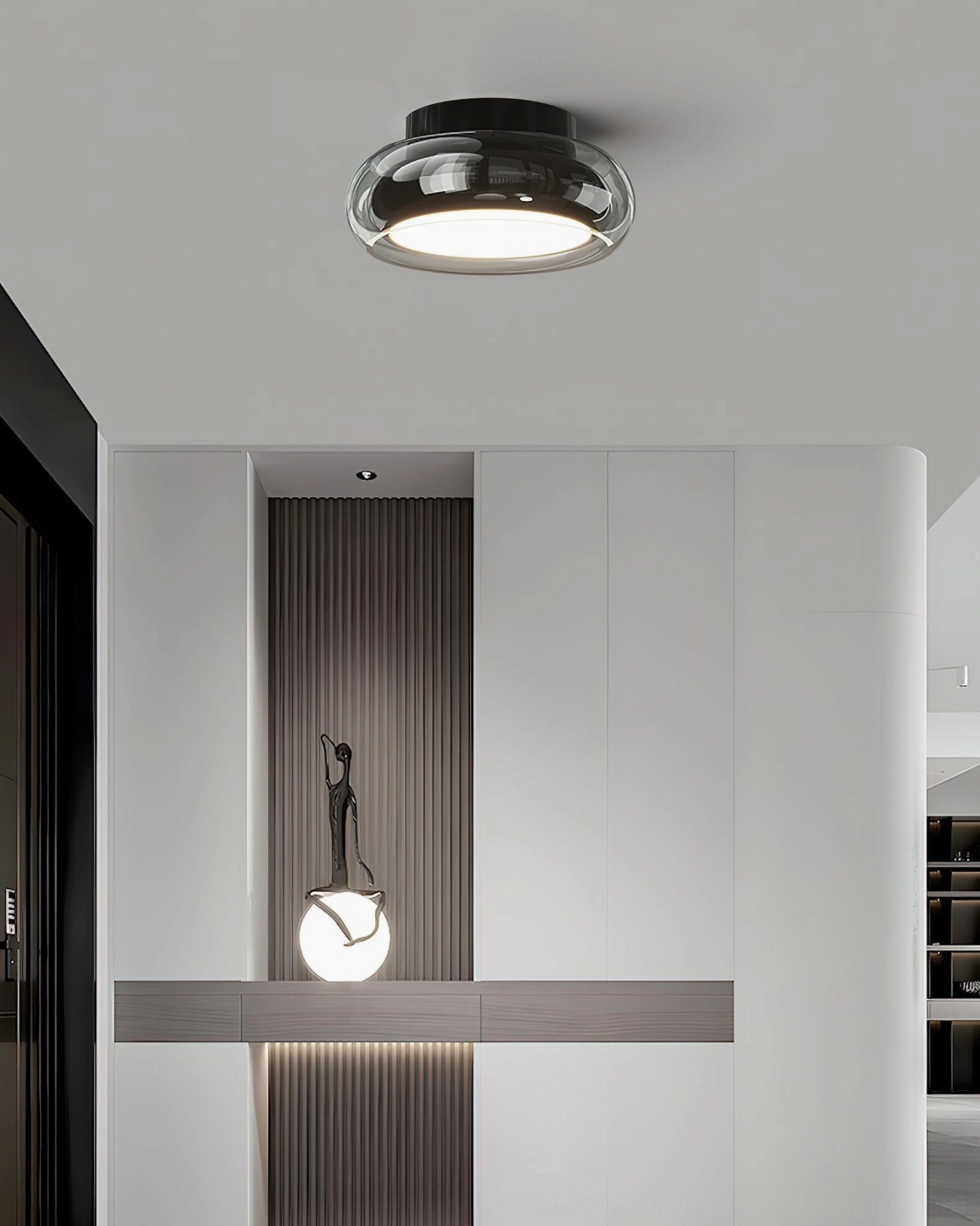 Single Richard ceiling lamp overhead view in modern minimalist foyer with warm glow