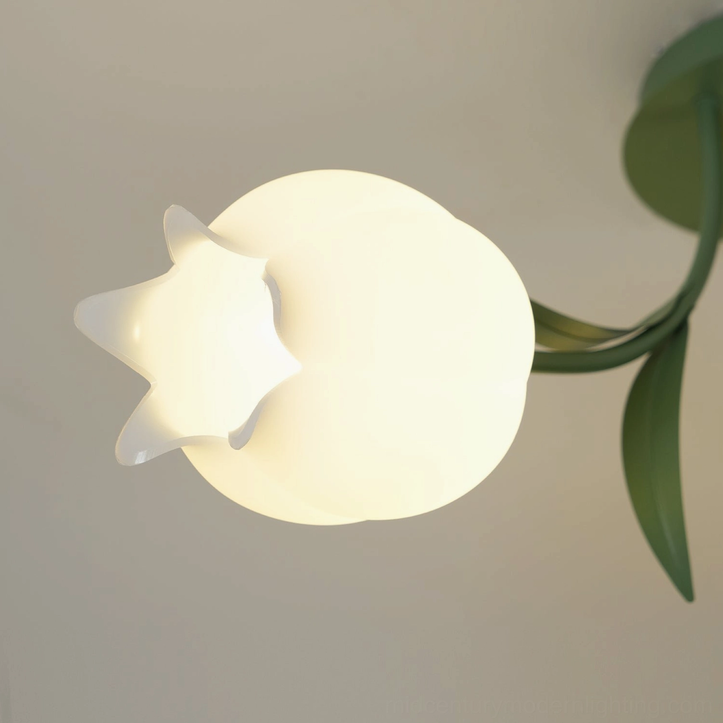 Ricko 3-head compact fixture overhead view metal leaves