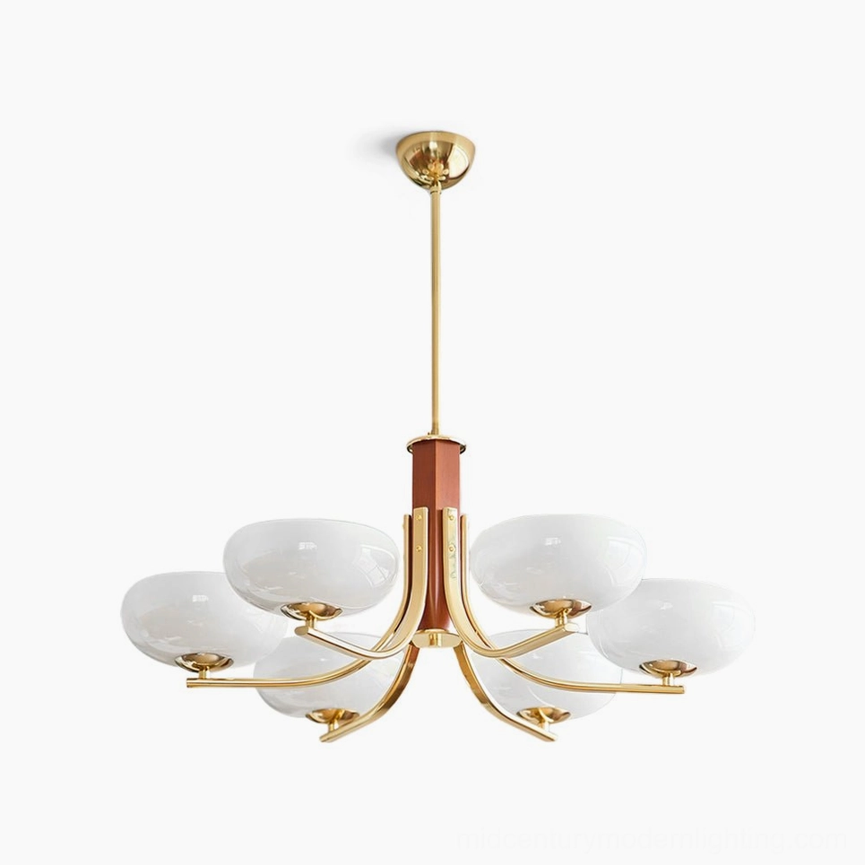 Six-arm Rico mid-century modern chandelier with brass gold finish and opal white glass shades, overhead studio view
