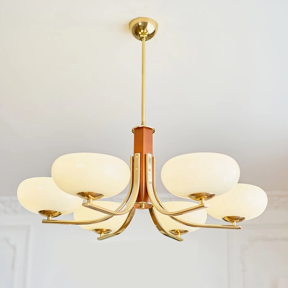 Rico six-head pendant chandelier with gold brass finish and warm beige glass