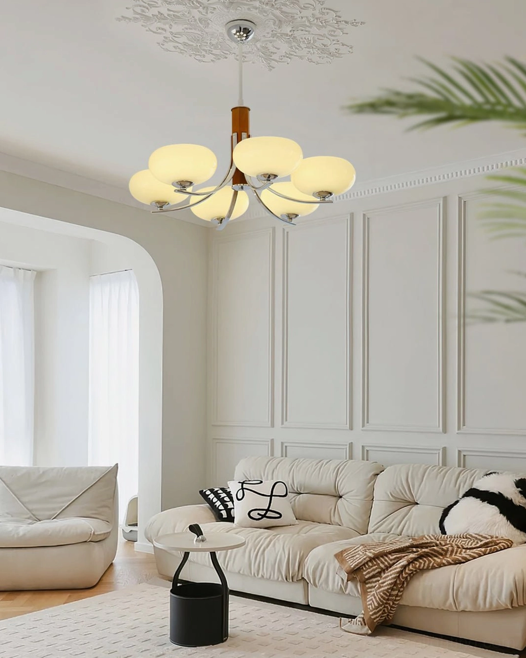 Six-light Rico mid-century pendant chandelier with warm brass and wood design in luxury beige living room