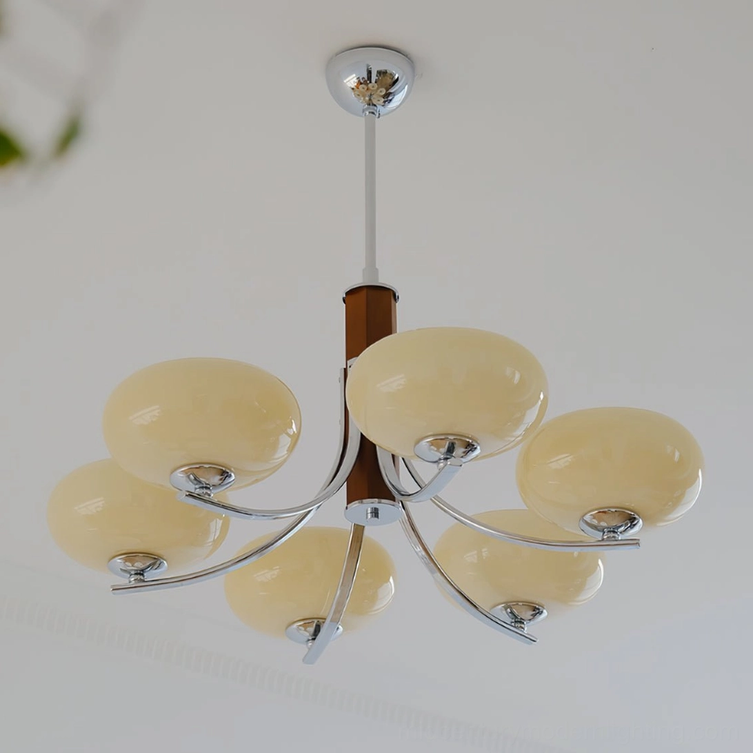 Rico mid-century modern pendant featuring sculptural metal frame and glass shades