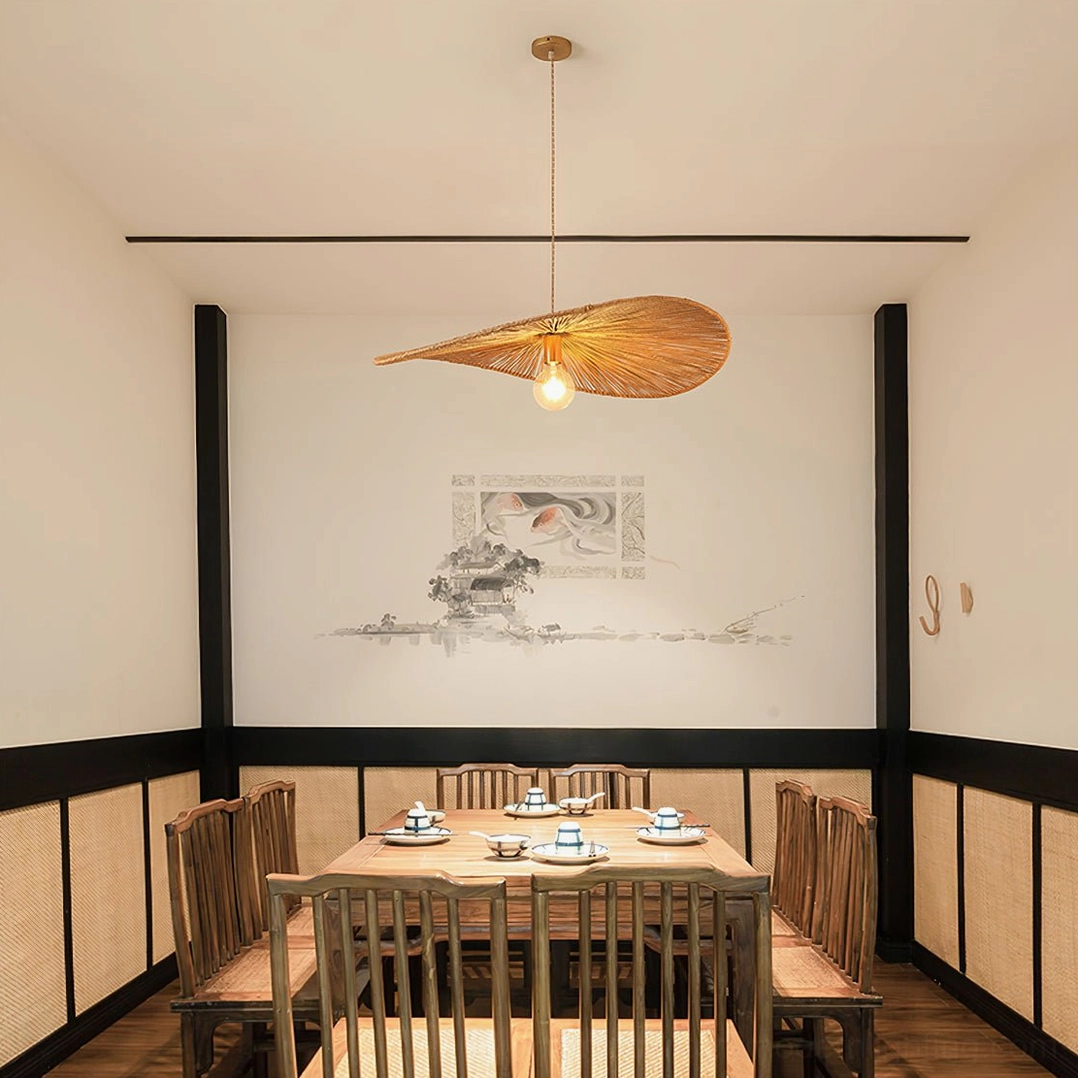 Ridotti natural rattan pendant light installed in traditional Japanese dining room creating elegant warm-toned ambiance