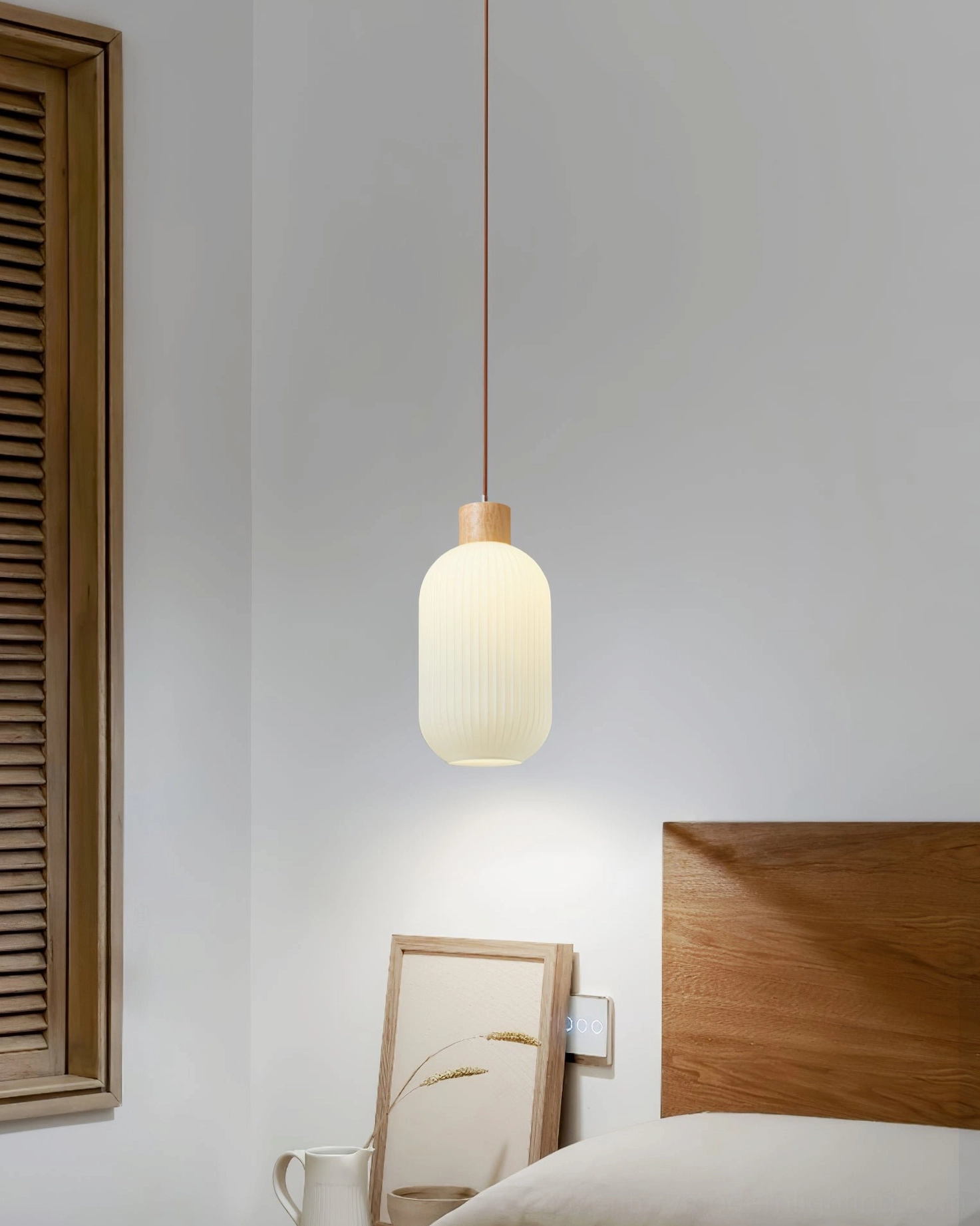 Rime pendant lamp close-up showing vertical ribbed glass texture and light refraction