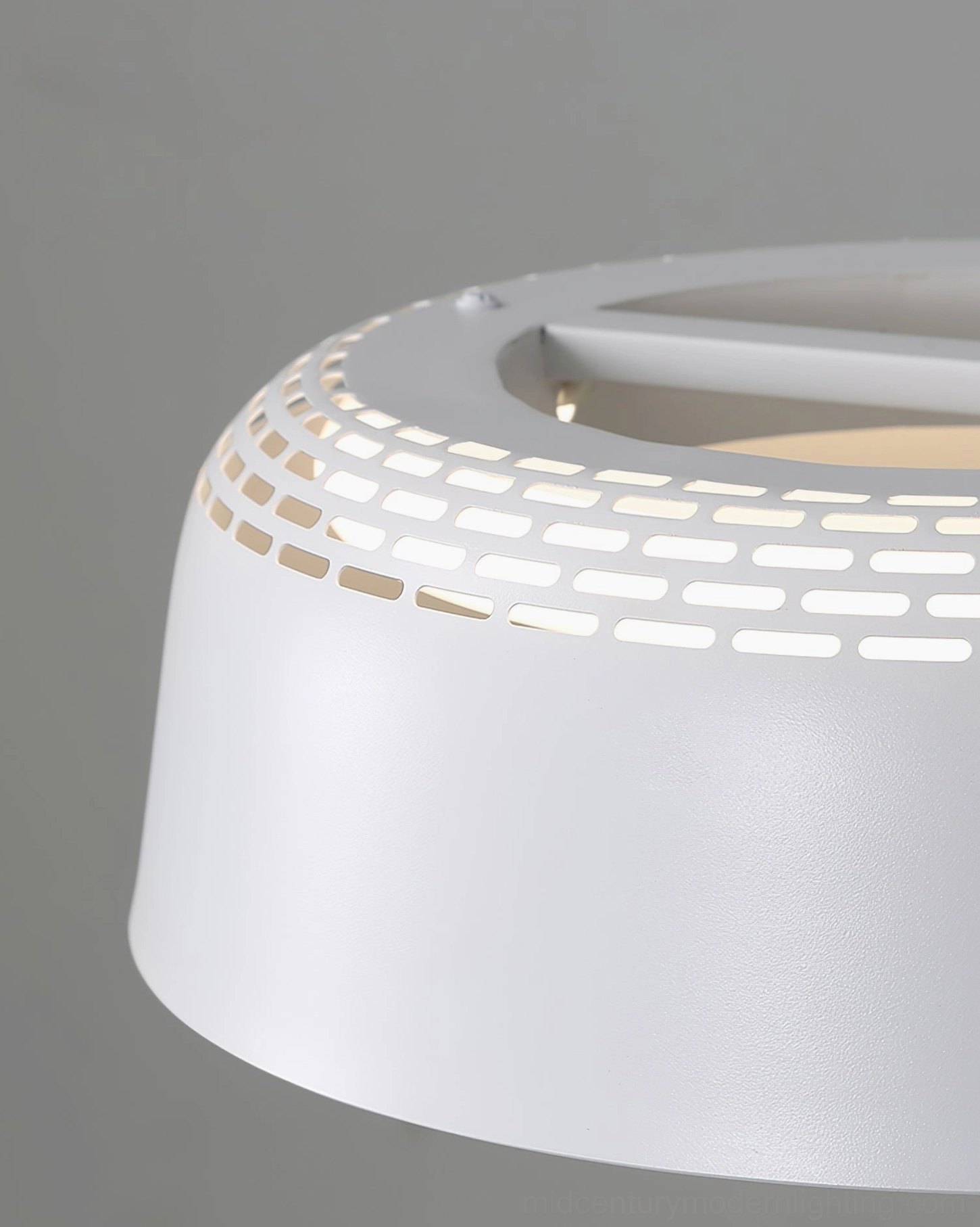 Ring pendant light fixture showing shadow diffusion and light distribution pattern on ceiling