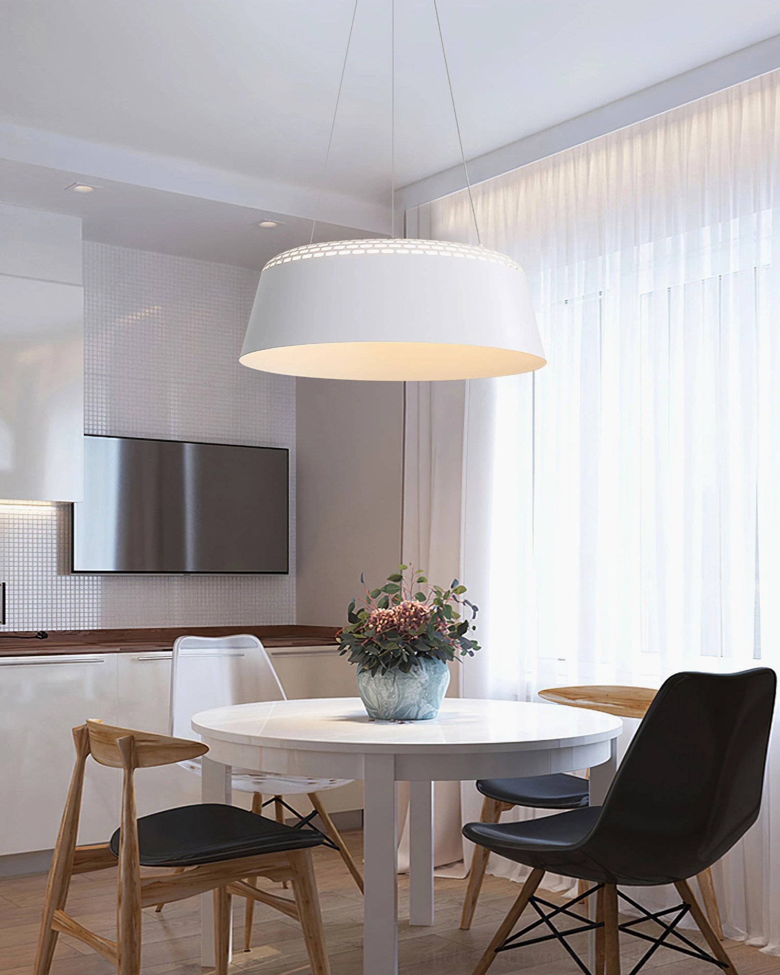 Ring white pendant lamp hanging in open-plan modern home dining and kitchen space