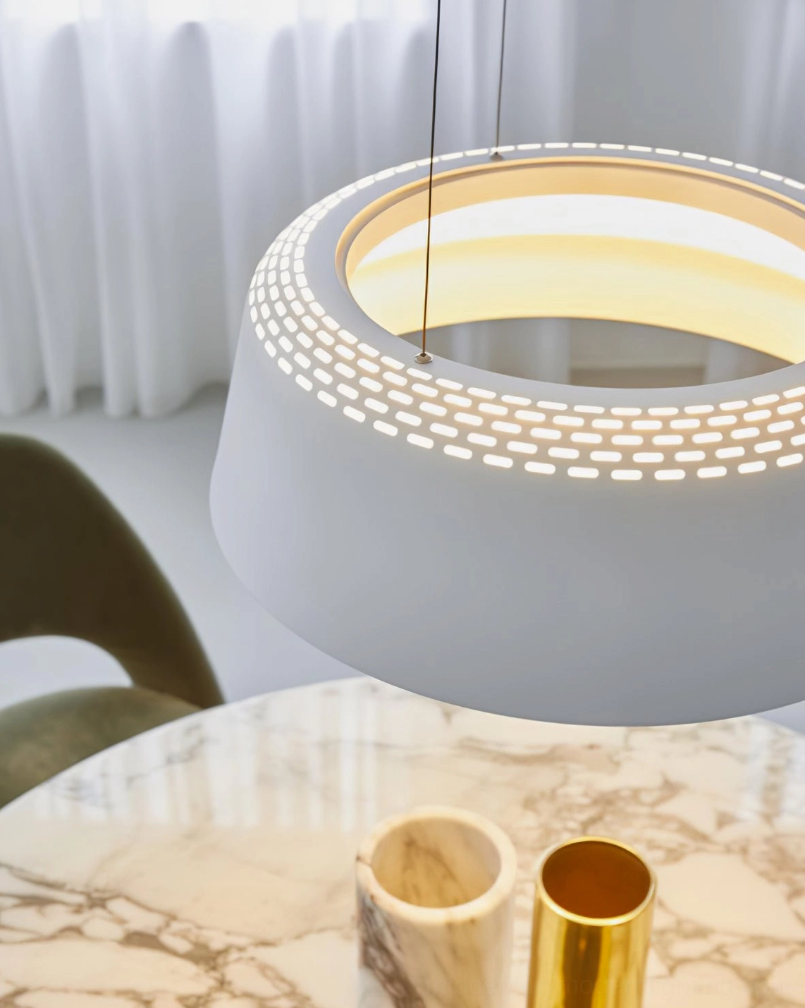 Ring minimalist drum pendant in upscale residential dining room with wood accents