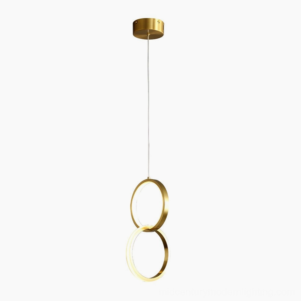 Rings stacked brass pendant lamp side profile studio white background warm LED illumination