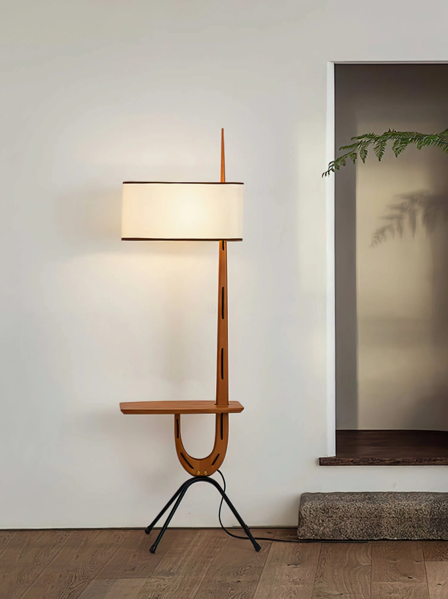 Rispal Giraffe Floor Lamp full product view from front angle showing complete profile with integrated console shelf and tripod base