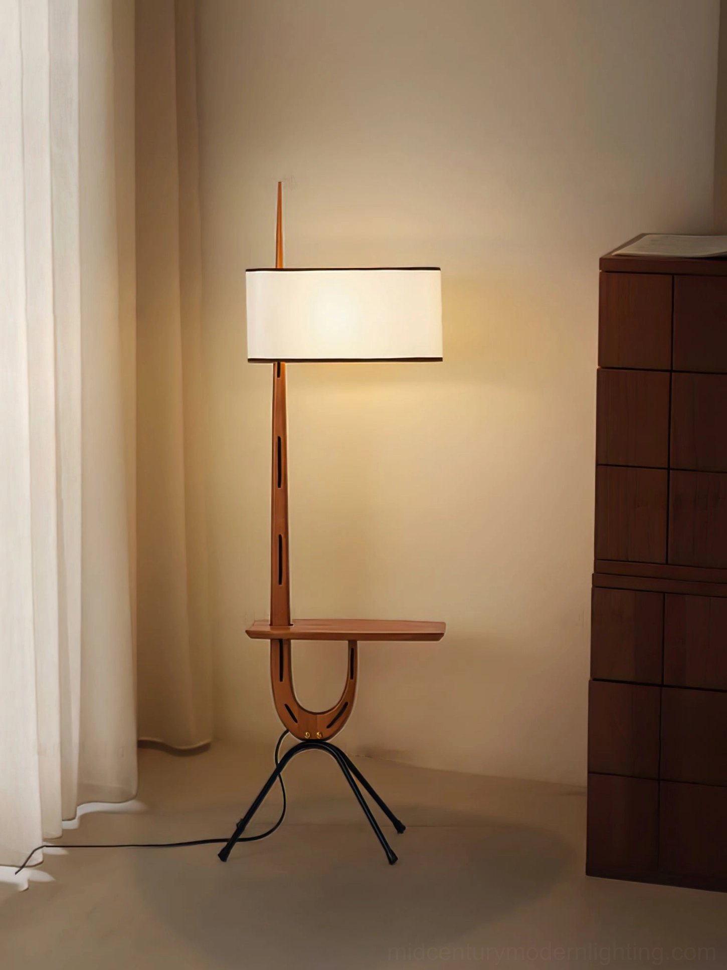 Rispal Giraffe Floor Lamp detail shot showing slotted walnut wood column and U-shaped foot with black iron tripod legs