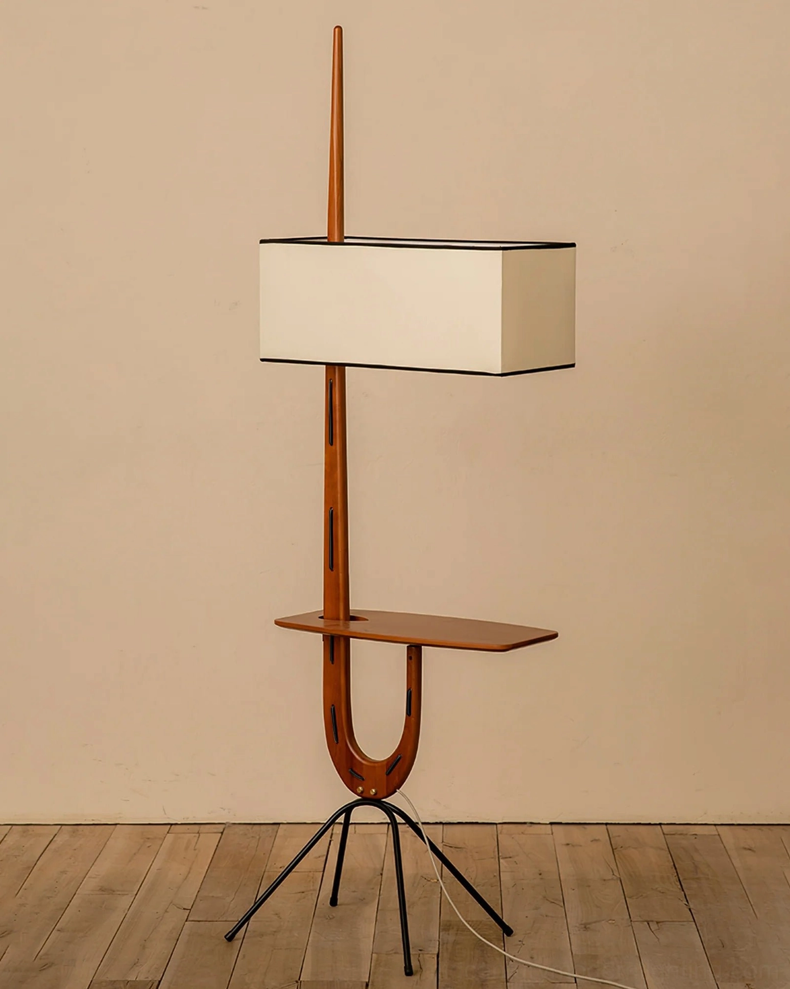Rispal Giraffe Floor Lamp unlit with integrated console shelf, clean product display on wooden floor against plain wall