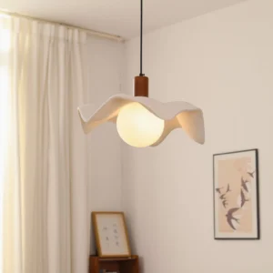 Rivale organic wavy pendant light installed in modern bedroom with soft warm glow