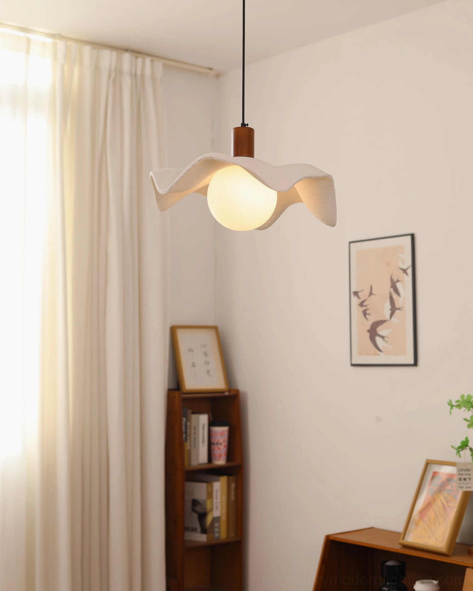 Rivale wavy pendant light with Edison bulb ambient warm glow installation