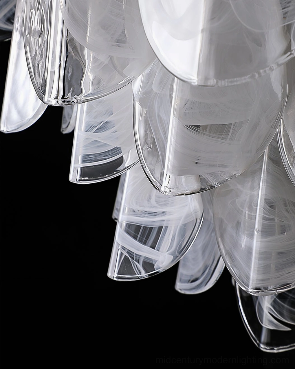 Rondini chandelier frosted glass shade close-up on black background, layered translucent matte finish