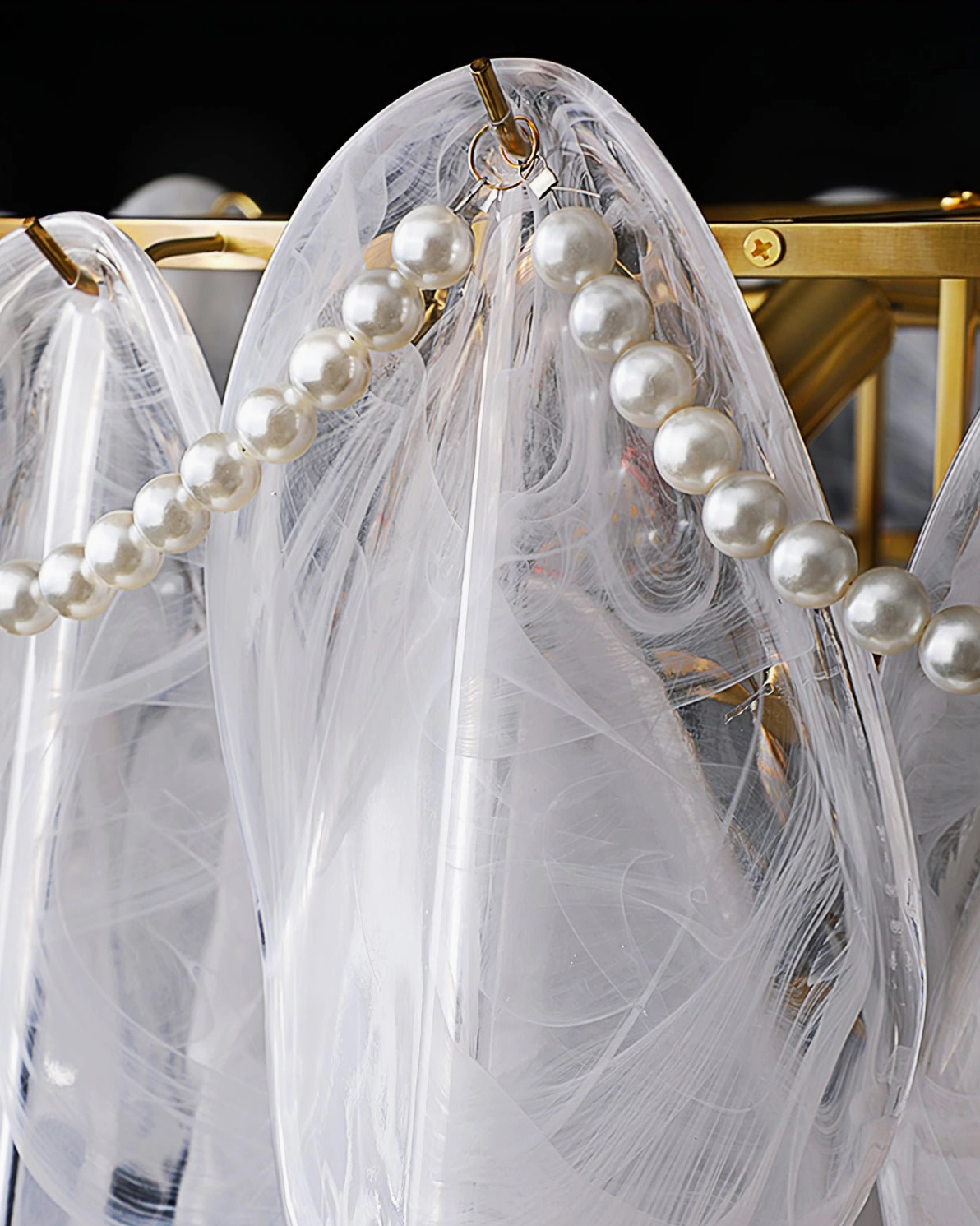 Rondini chandelier close-up of pearl beaded stranding and textured glass shades, artisanal craftsmanship detail