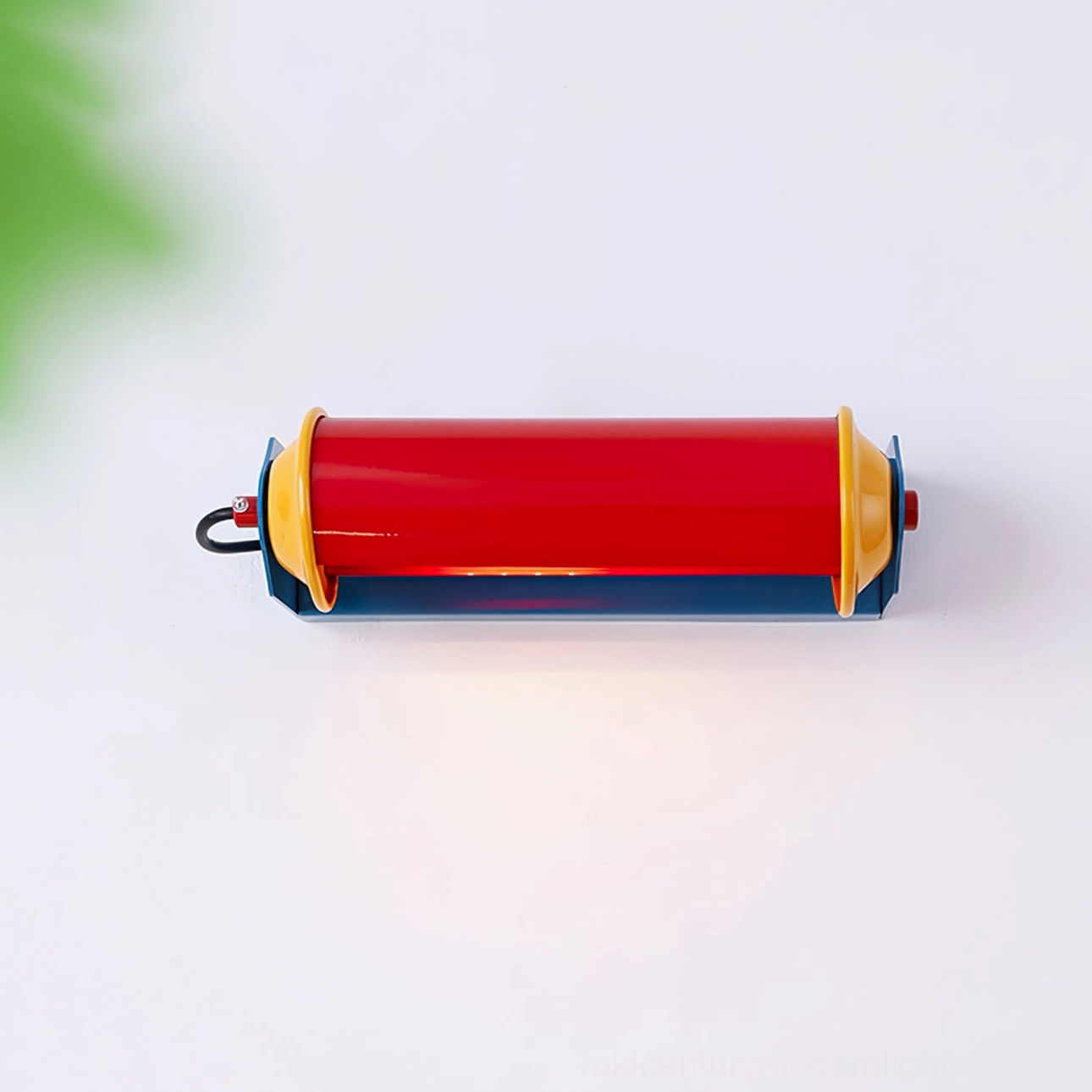 Rondo wall lamp top flat lay view showing red locking button and cylindrical shape