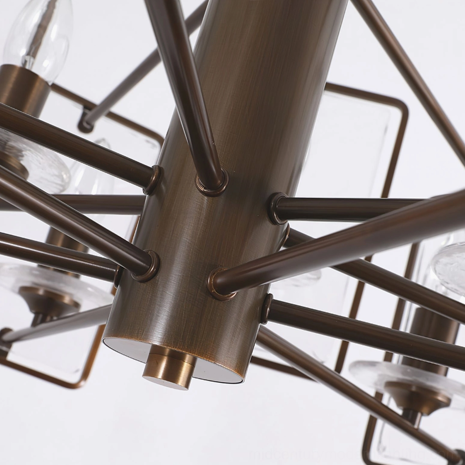 Rosalind chandelier bottom view macro showing brushed bronze metal frame and E14 candle bulb sockets
