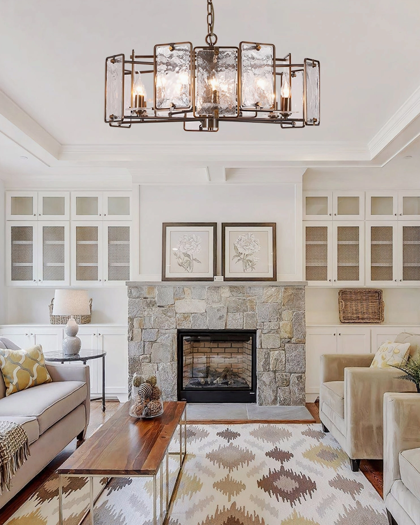 Rosalind antique bronze chandelier in minimalist white living room with stone fireplace