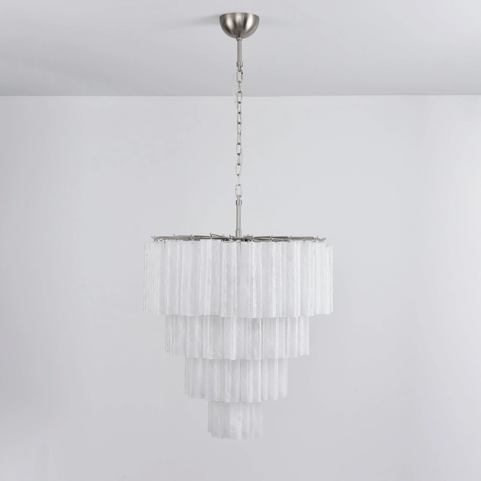 Rose pink tiered glass chandelier installation view grand foyer dramatic statement piece