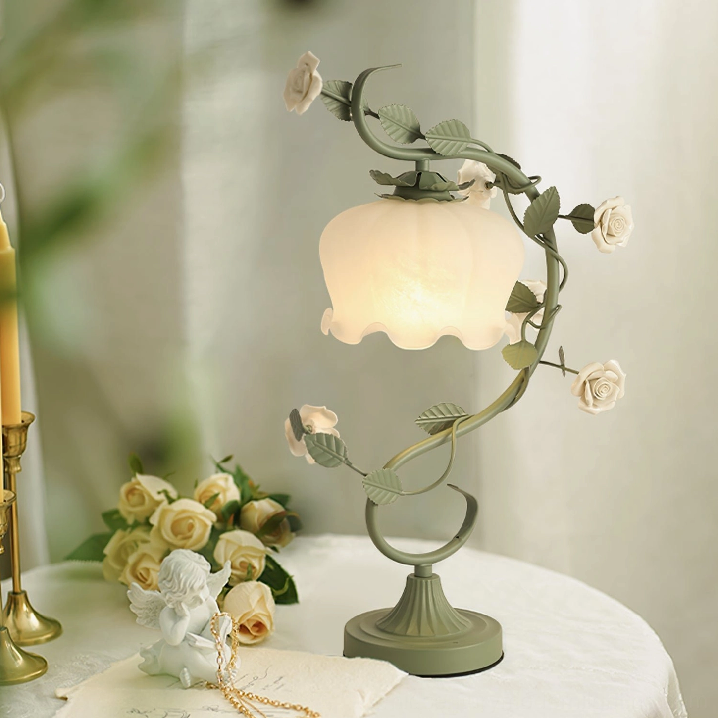 Illuminated rose vine lamp on tabletop with floral ornaments, warm-toned ruffled lampshade glowing