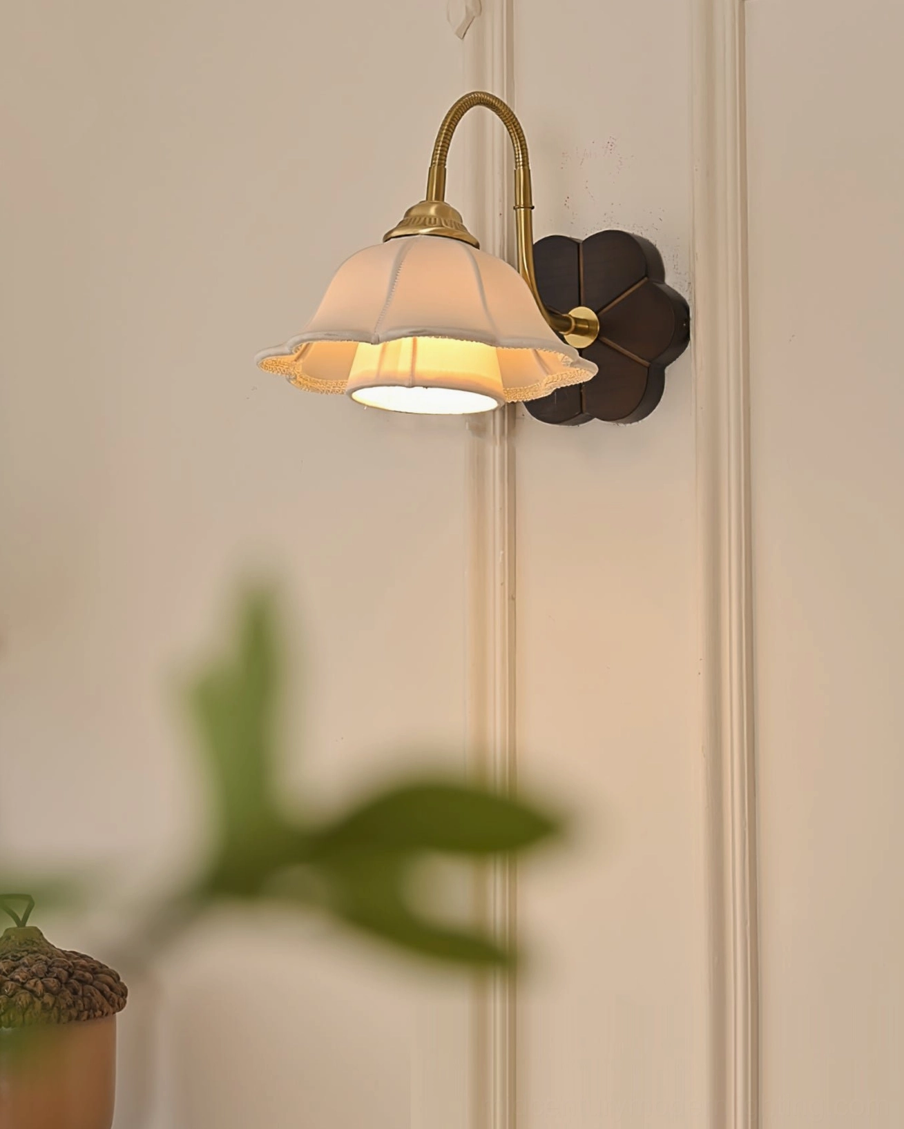 Rosette wall sconce full profile view showing brass gooseneck articulation and fabric shade proportions