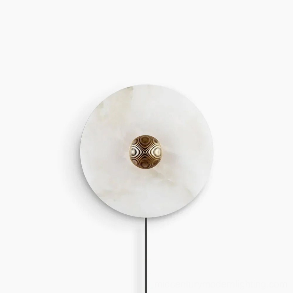 Round alabaster plug-in wall sconce with ribbed bronze center, frontal view on white background