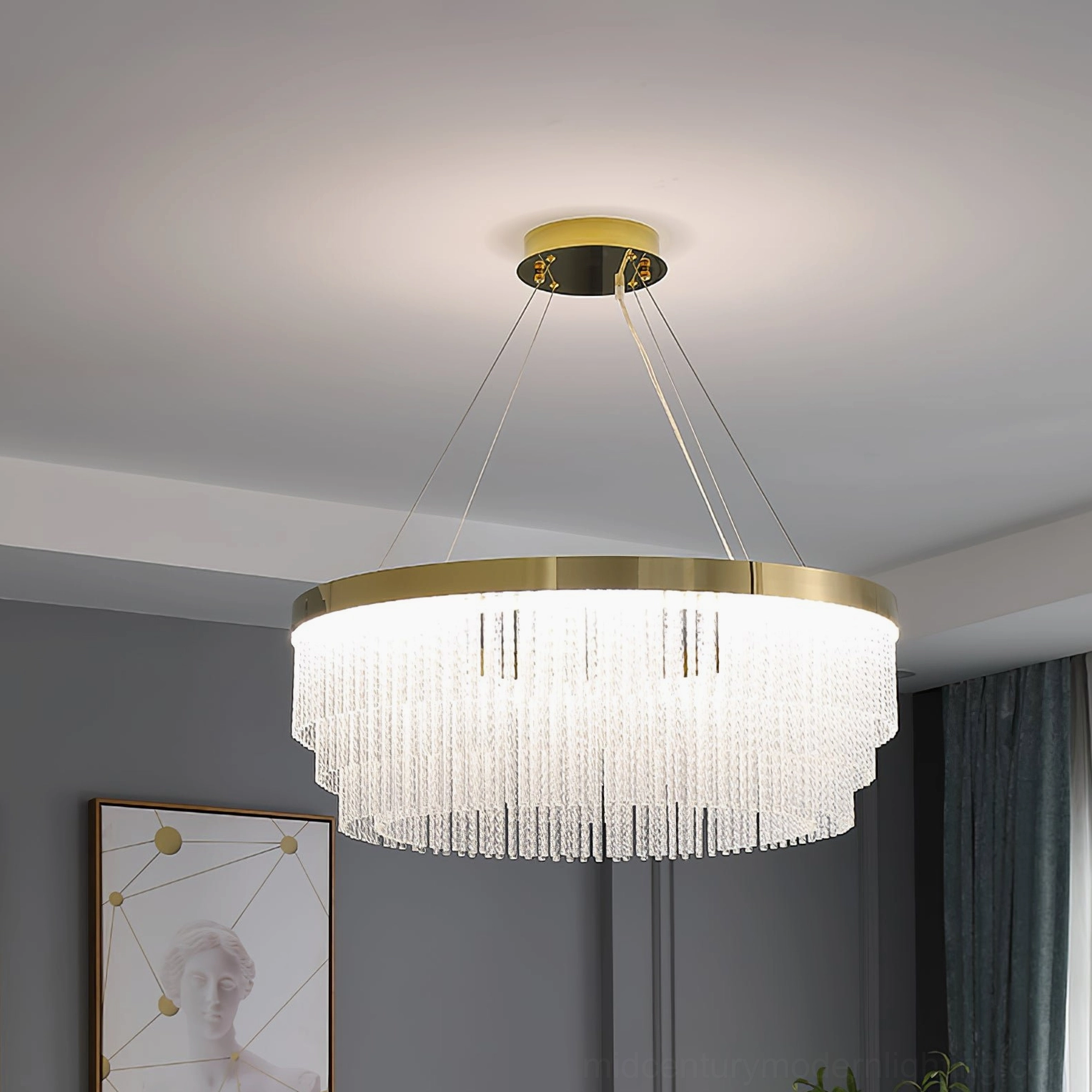 Tiered round crystal chandelier with gold brass suspension and layered crystal glass design element