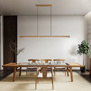Sabine Wood Chandelier suspended over modern dining table in Scandinavian style dining room with warm lighting
