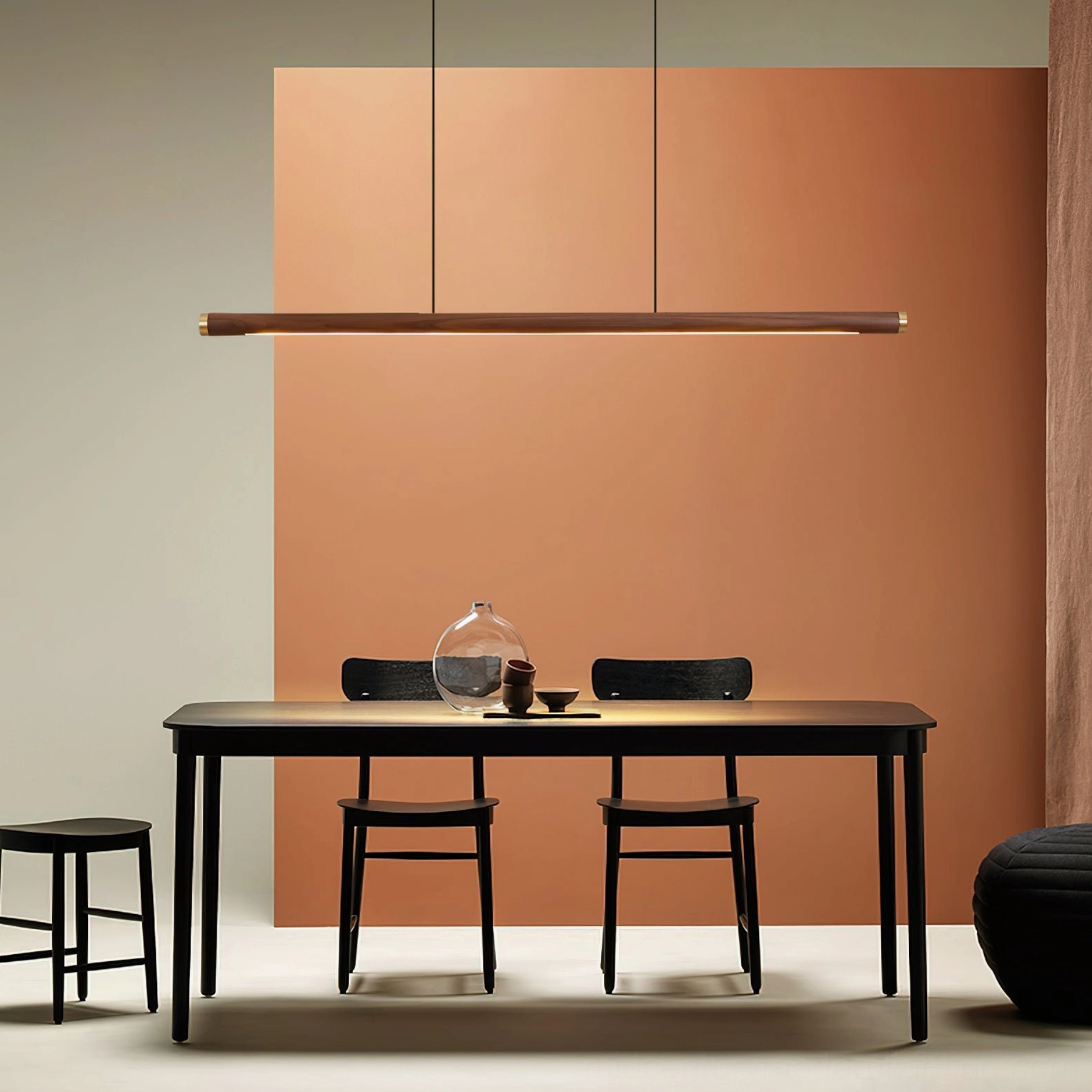 Sabine Wood Chandelier over small two-person dining nook with terracotta accent wall modern interior