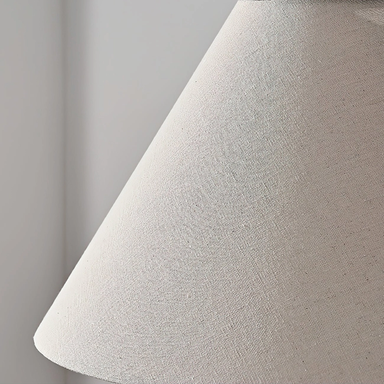 Sacha marble lamp conical beige linen fabric shade close-up detail, woven textured surface showing premium material quality