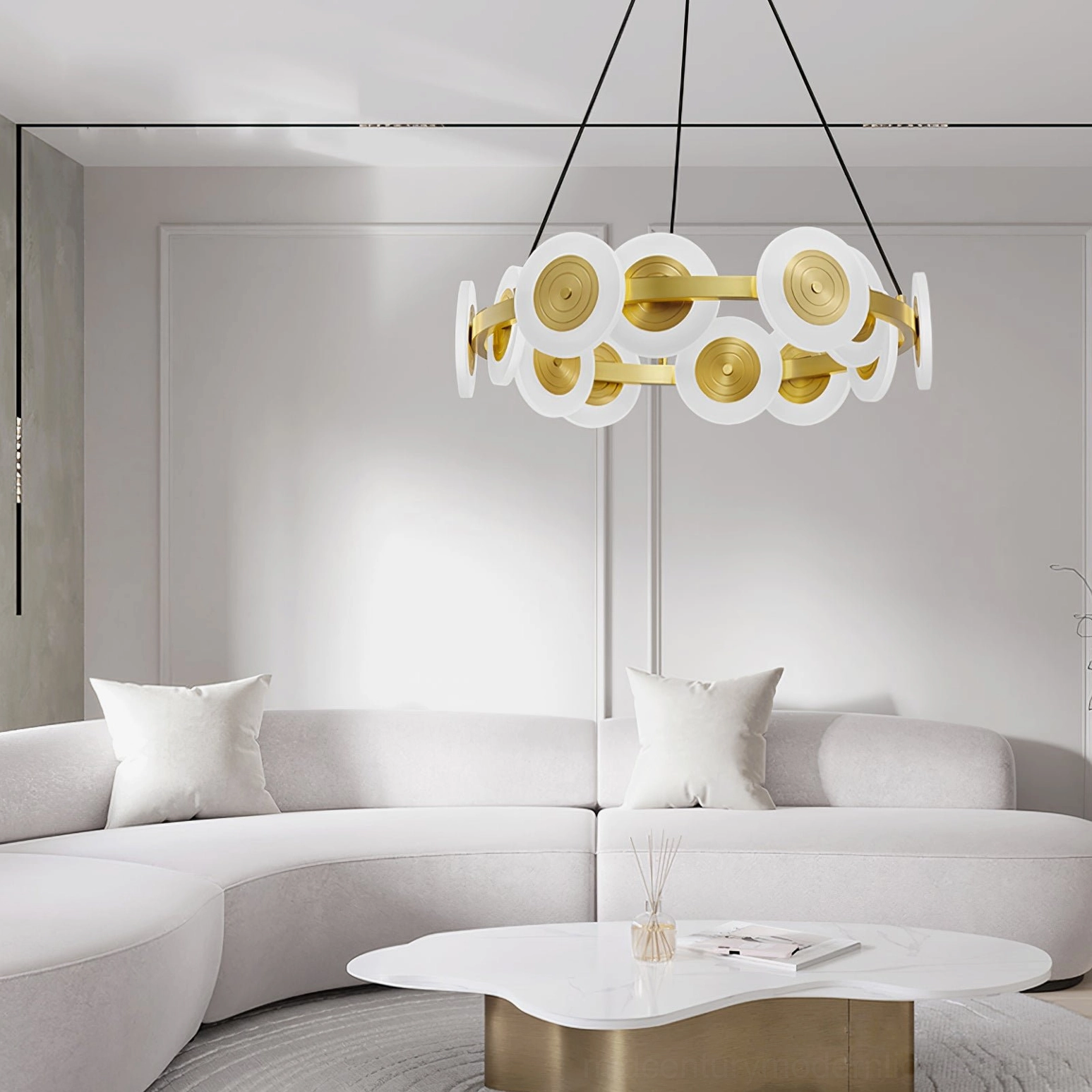 Samiya pendant light hanging in minimalist white living room with curved sofa, cozy high-end decor